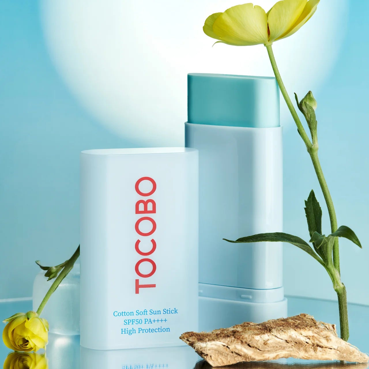 Tocobo skincare products with flowers 